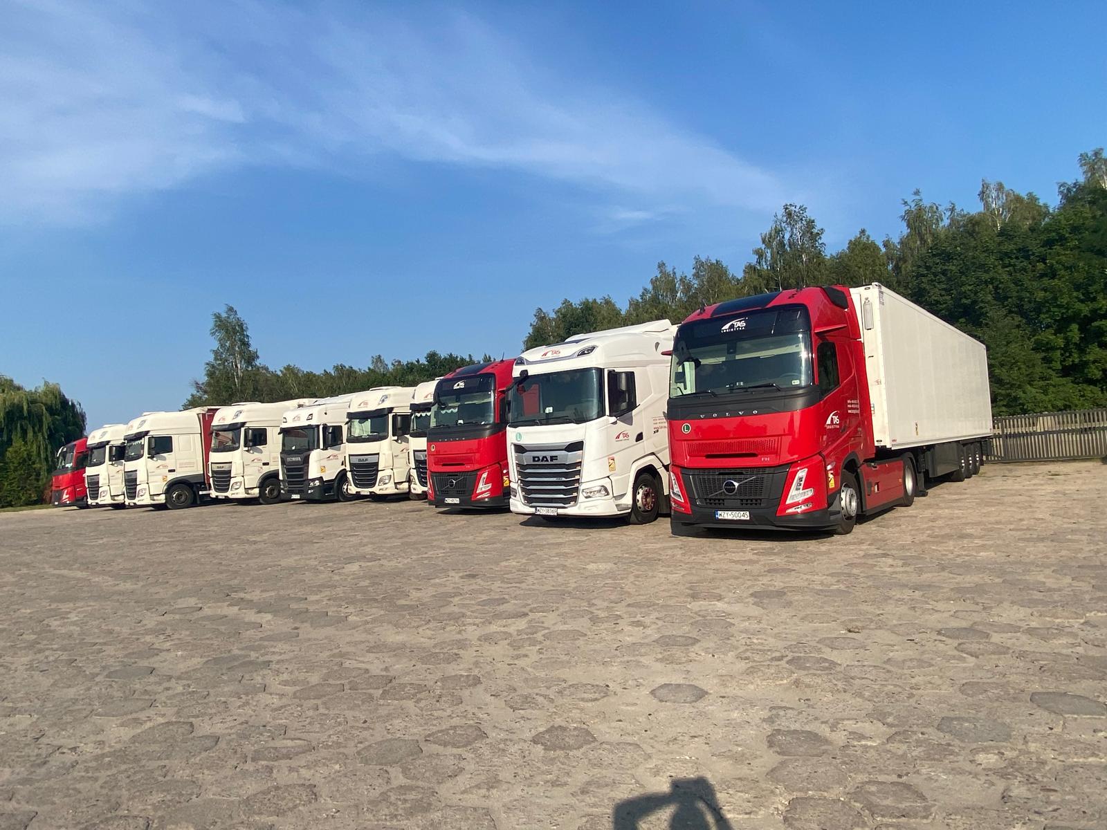 Red trucks in the logistics yard